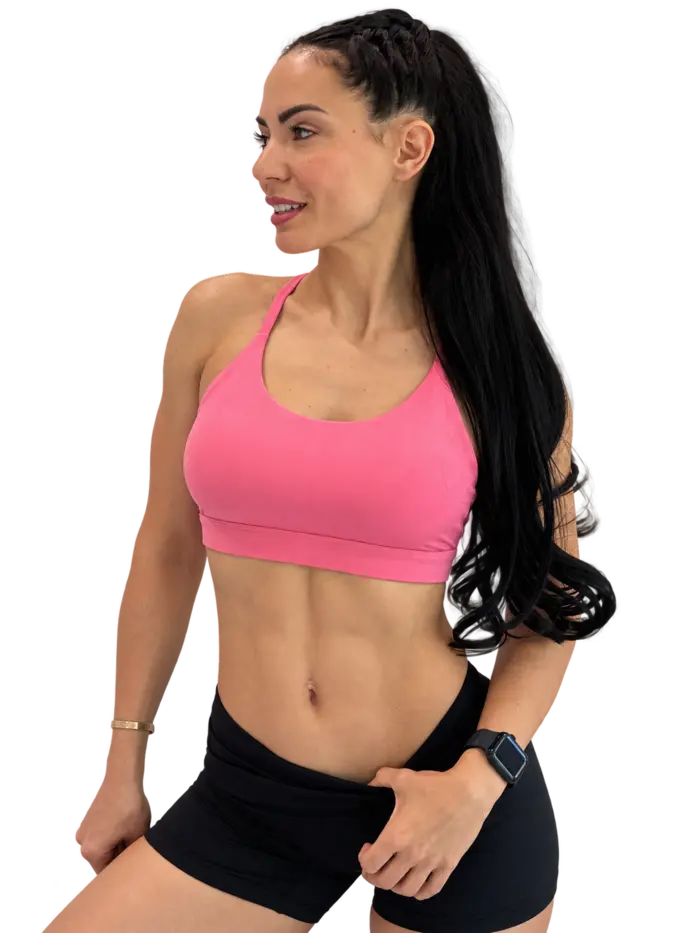 Elzhana in pink workout clothing